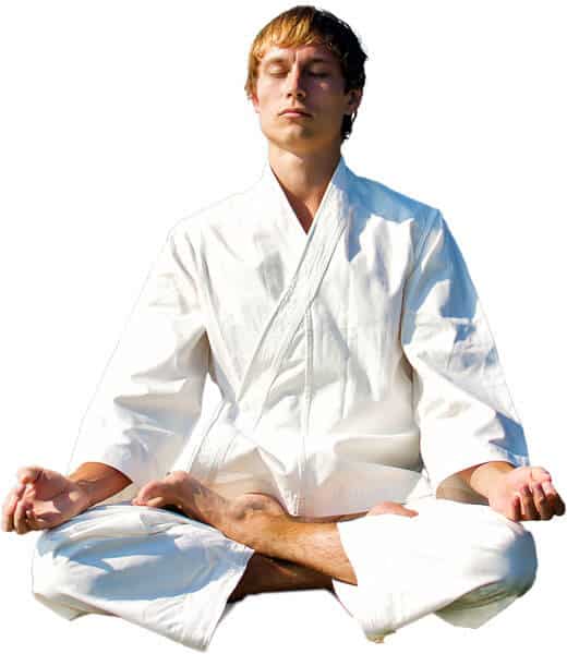 Martial Arts Lessons for Adults in Carmichael CA - Young Man Thinking and Meditating in White